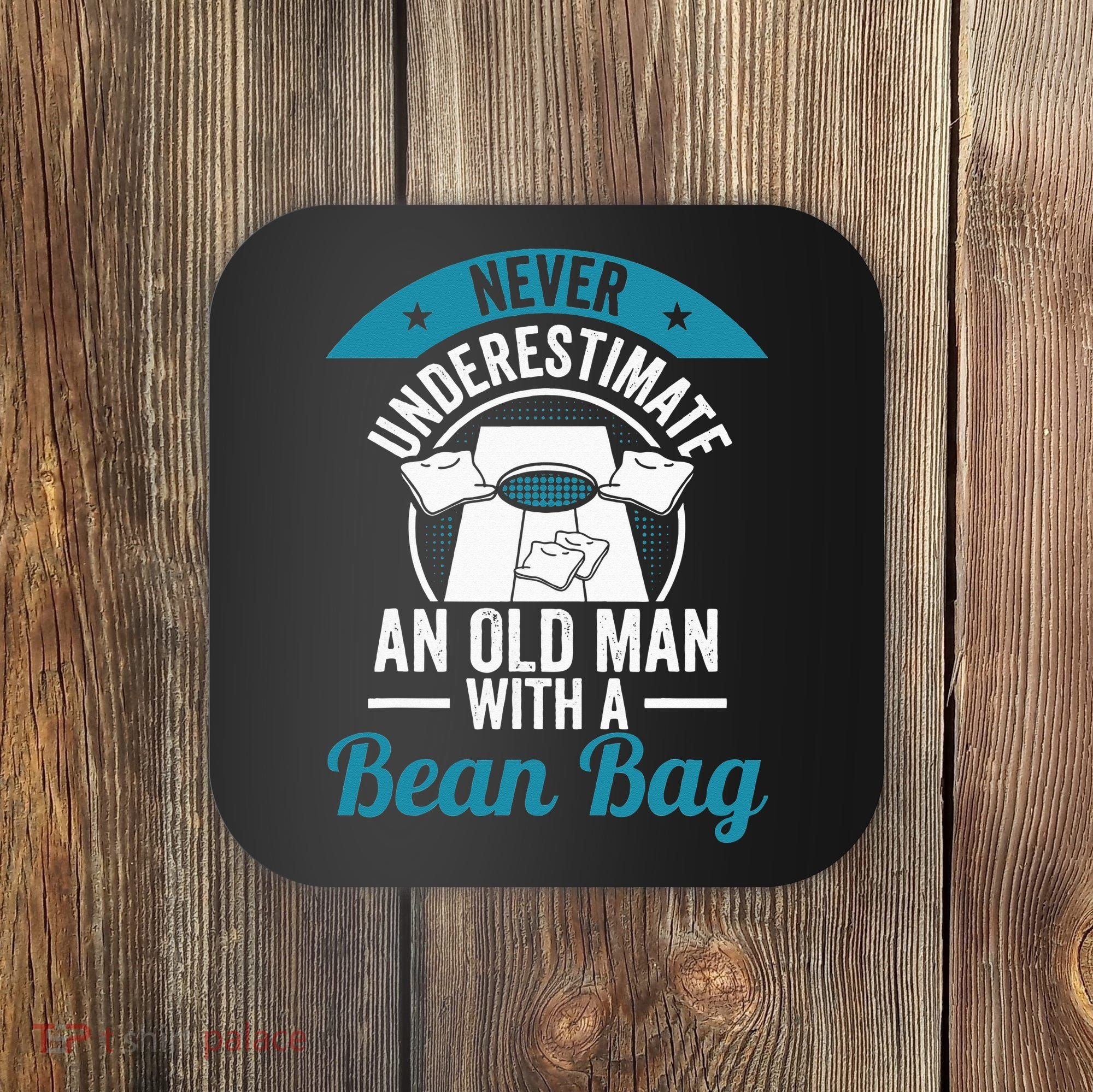 Never Underestimate An Old Man With A Bean Bag Cornhole Coaster