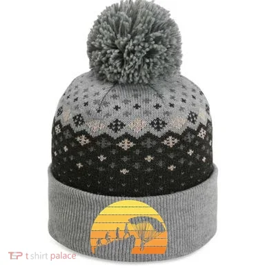 Parachuting Evolution The Baniff Cuffed Pom Beanie