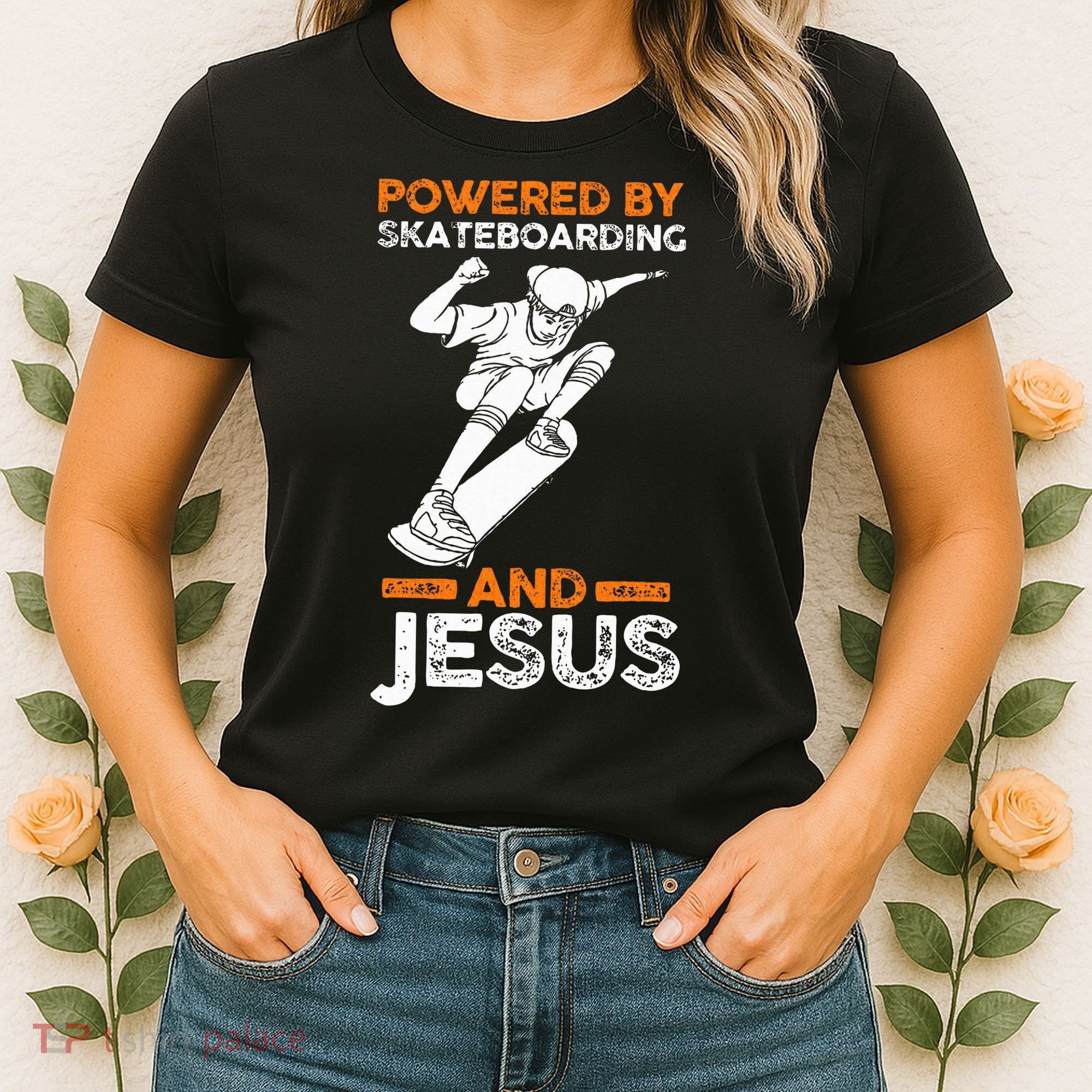 Powered by skateboarding and jesus Women's T-Shirt