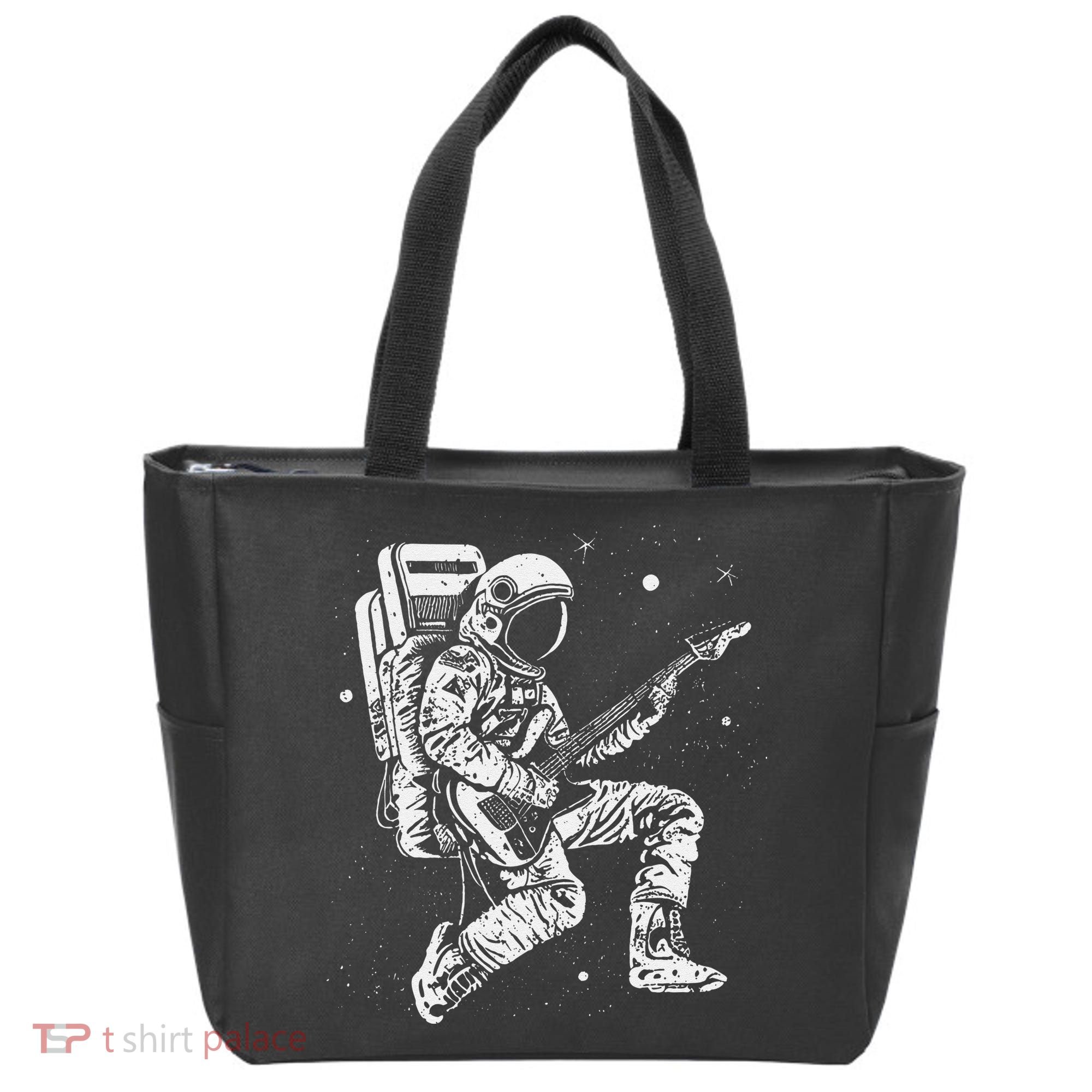 retro Astronaut playing electric guitar in space Tote Bag