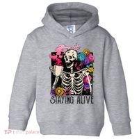 Retro Groovy Skeleton Staying Alive Coffee Halloween Hippie Toddler Hoodie thumb 0