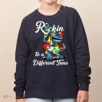 Rockin To A Different Tune Autism Dinosaur Women's Sweatshirt thumb 0