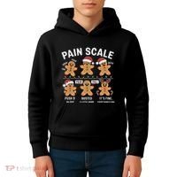 Retro Pain Scale Gingerbread Nurse Christmas Vibes Kids Hoodie thumb 4
