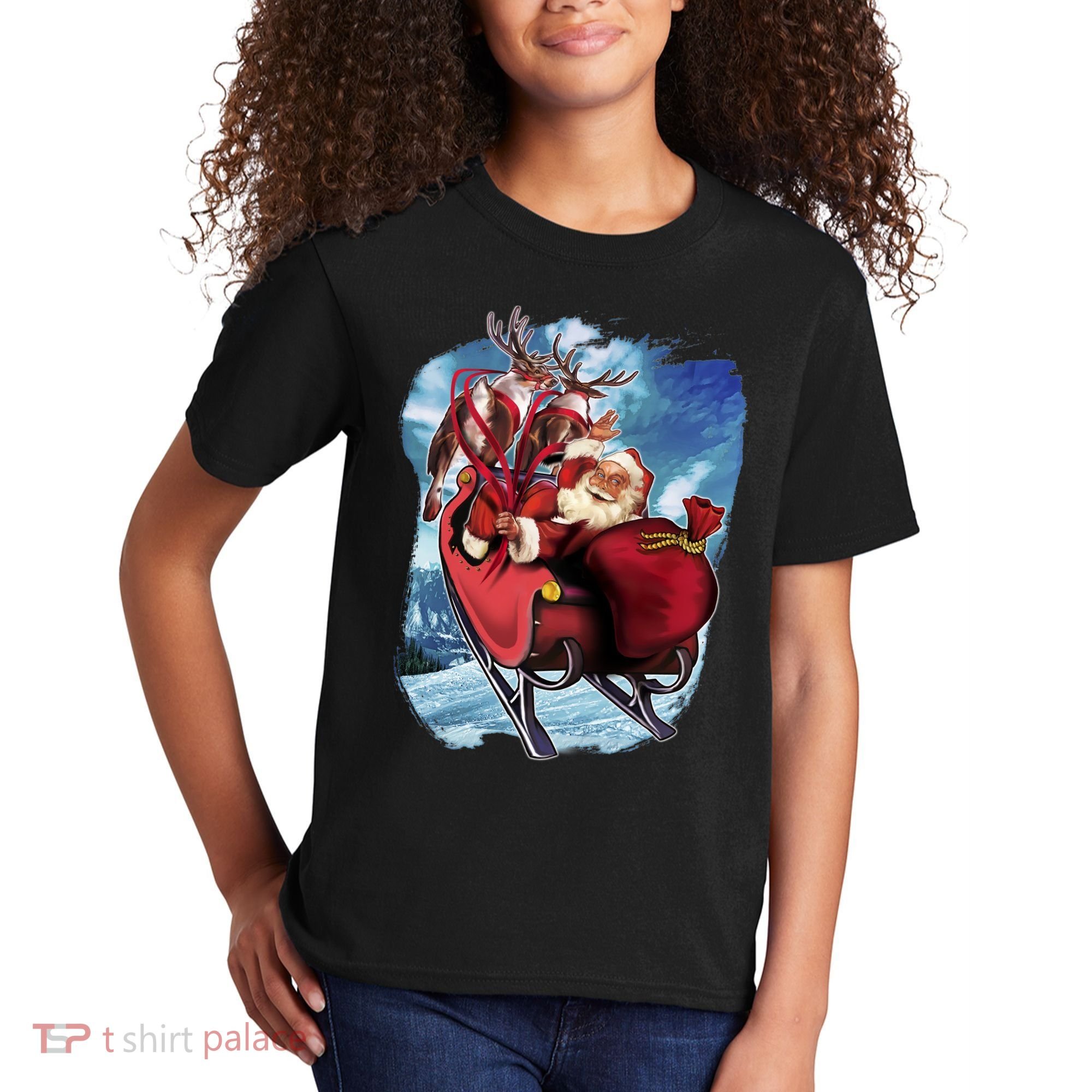Santa Reindeer Sleigh Flying Over Snow Kids T-Shirt