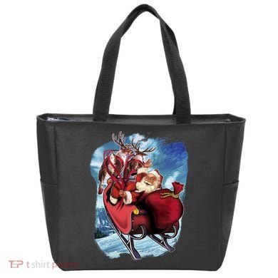 Santa Reindeer Sleigh Flying Over Snow Tote Bag