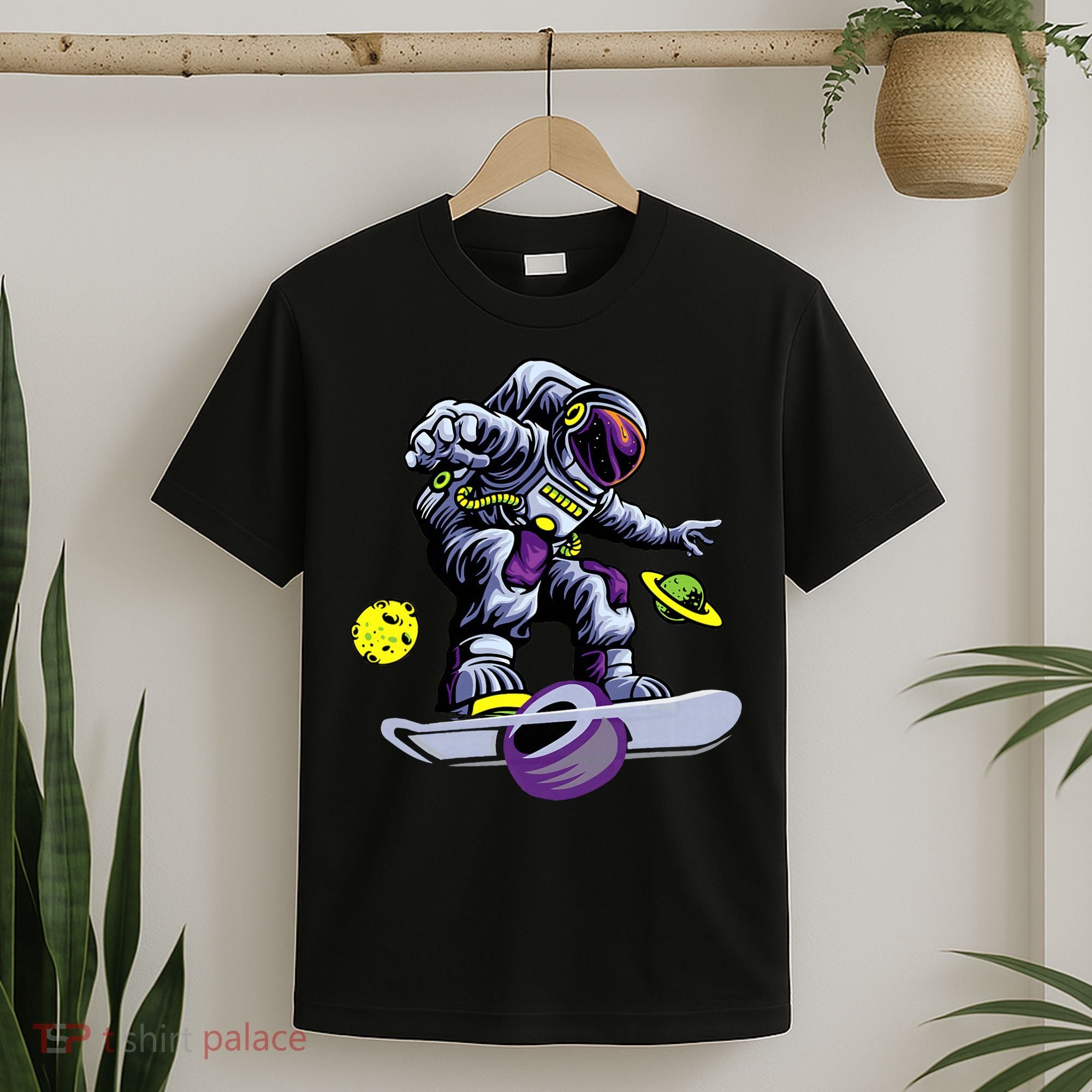 Skating astronaut on onewheel skateboard T-Shirt