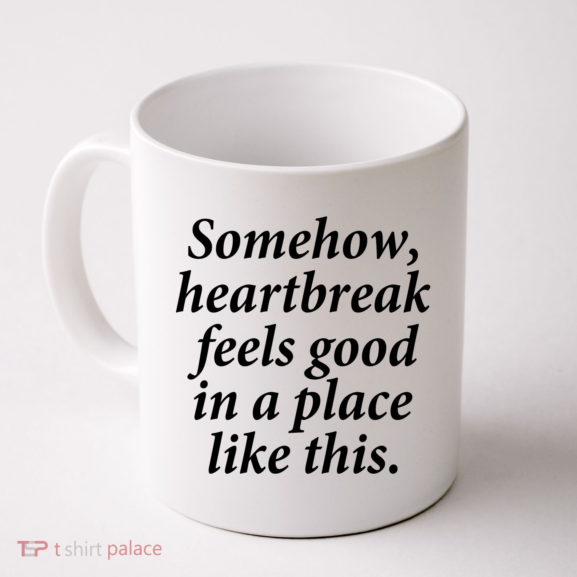 Somehow Heartbreak Feels Good In A Place Like This Coffee Mug