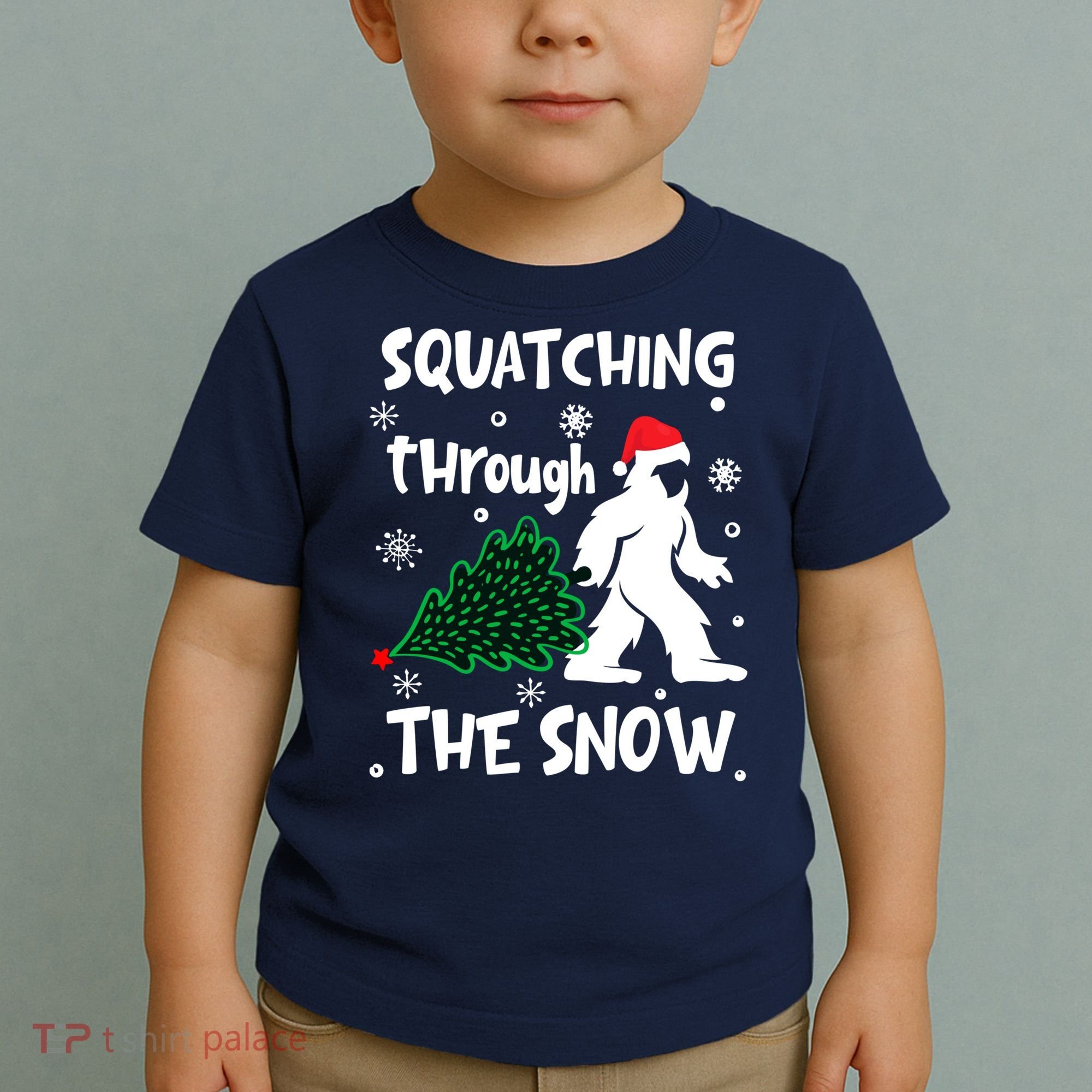Squatching Through The Snow Christmas Sasquatch Santa Hat Toddler T-Shirt