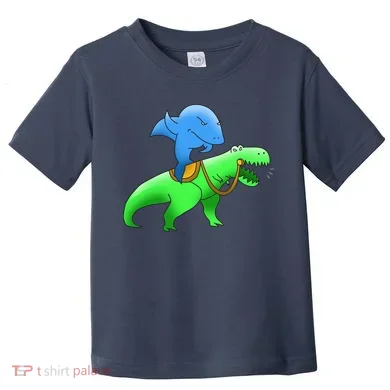 T-Rex Riding A Shark Toddler T-Shirt
