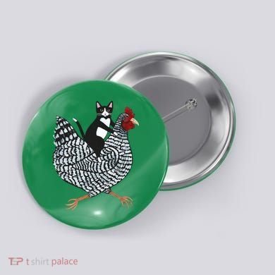 Tuxedo Cat On A Chicken Button
