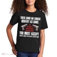 These Guns No Longer Identify As Guns Funny Gun Kids T-Shirt thumb 2