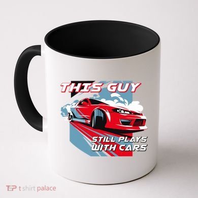 This Guy Still Plays With Cars Coffee Mug