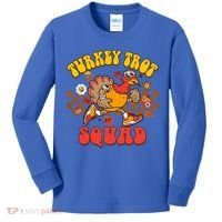 Turkey Trot Squad Funny Thanksgiving Running Fall Turkey Gift Kids Long Sleeve Shirt thumb 0