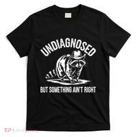 Undiagnosed But Something AinT Right Cowboy Funny Raccoon T-Shirt thumb 0