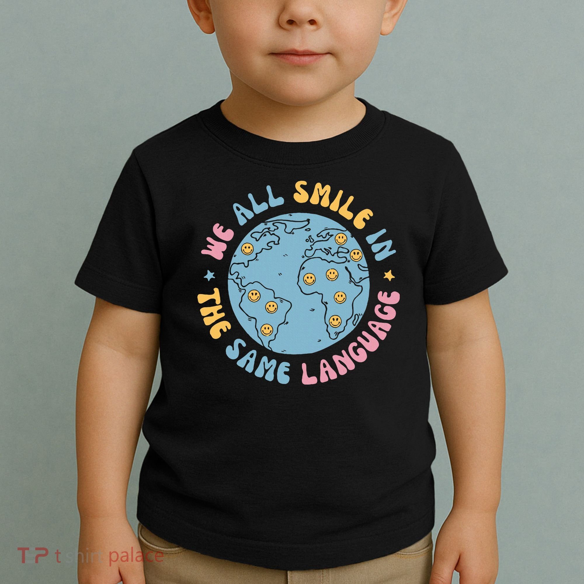 We All Smile In The Same Language Funny Esl Teacher Toddler T-Shirt