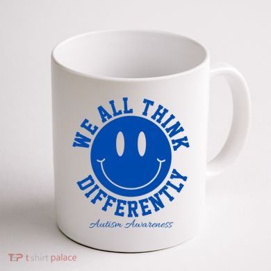 We All Think Differently Autism Awareness Smile Face Coffee Mug back