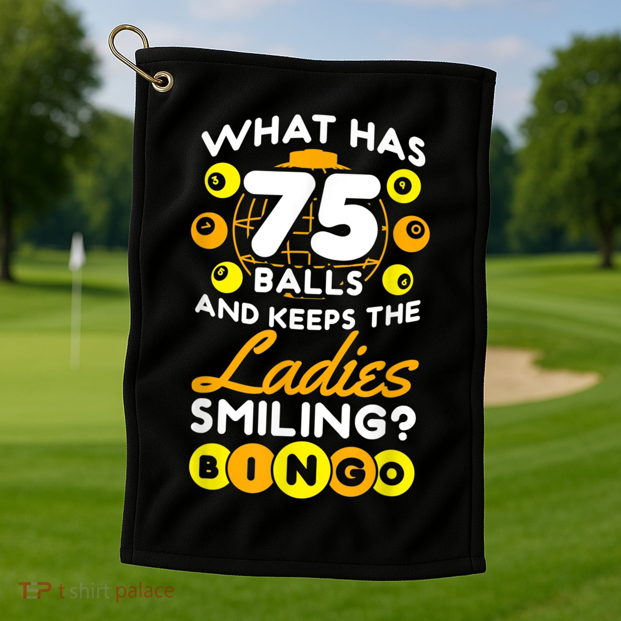 What Has 75 Balls And Keeps The Ladies Smiling Golf Towel