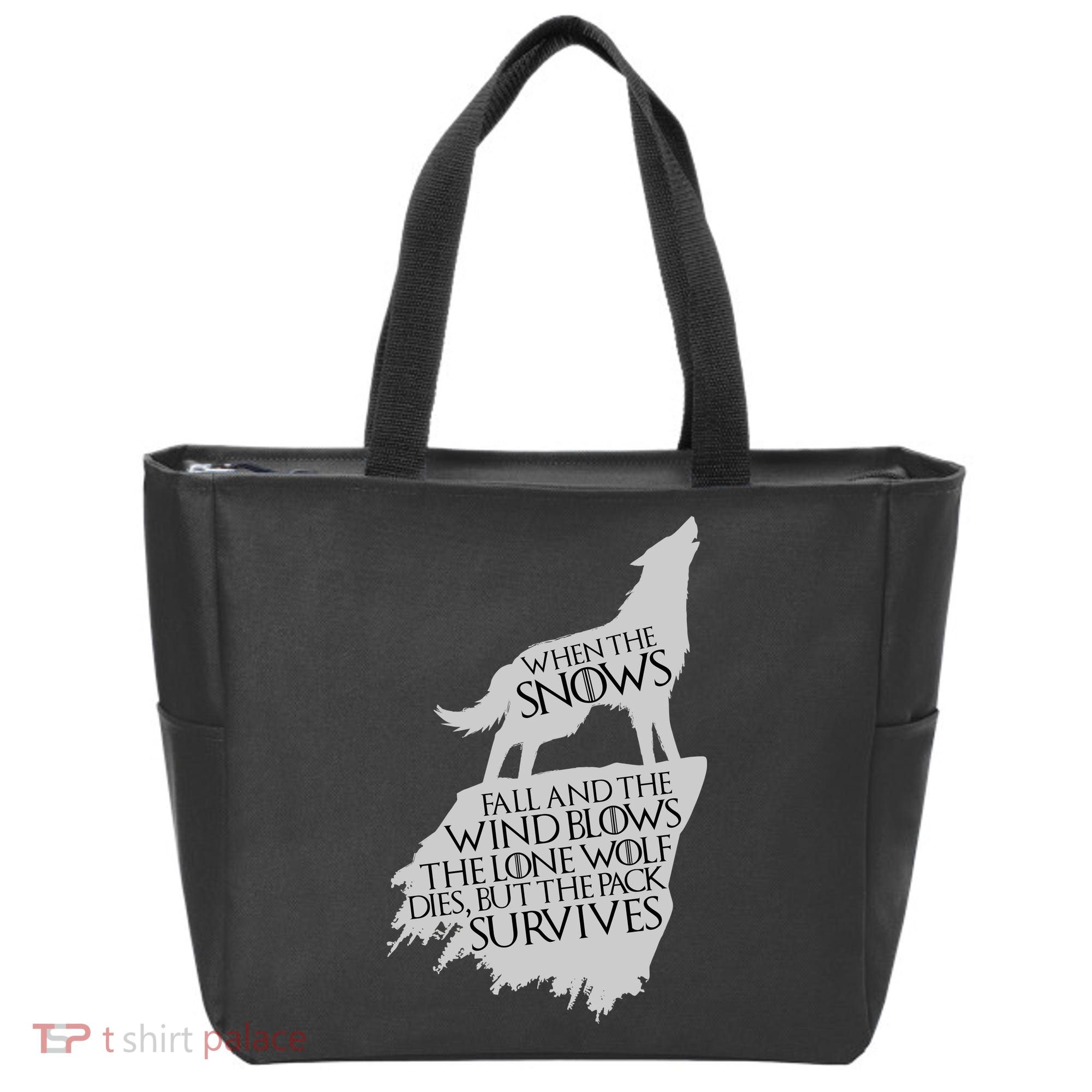 When The Snows Fall The Lone Wolf Dies, But the Pack Survives Tote Bag