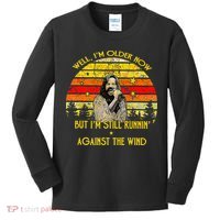 Well I’M Older Now But I’M Still Running Against The Wind Kids Long Sleeve Shirt thumb 0