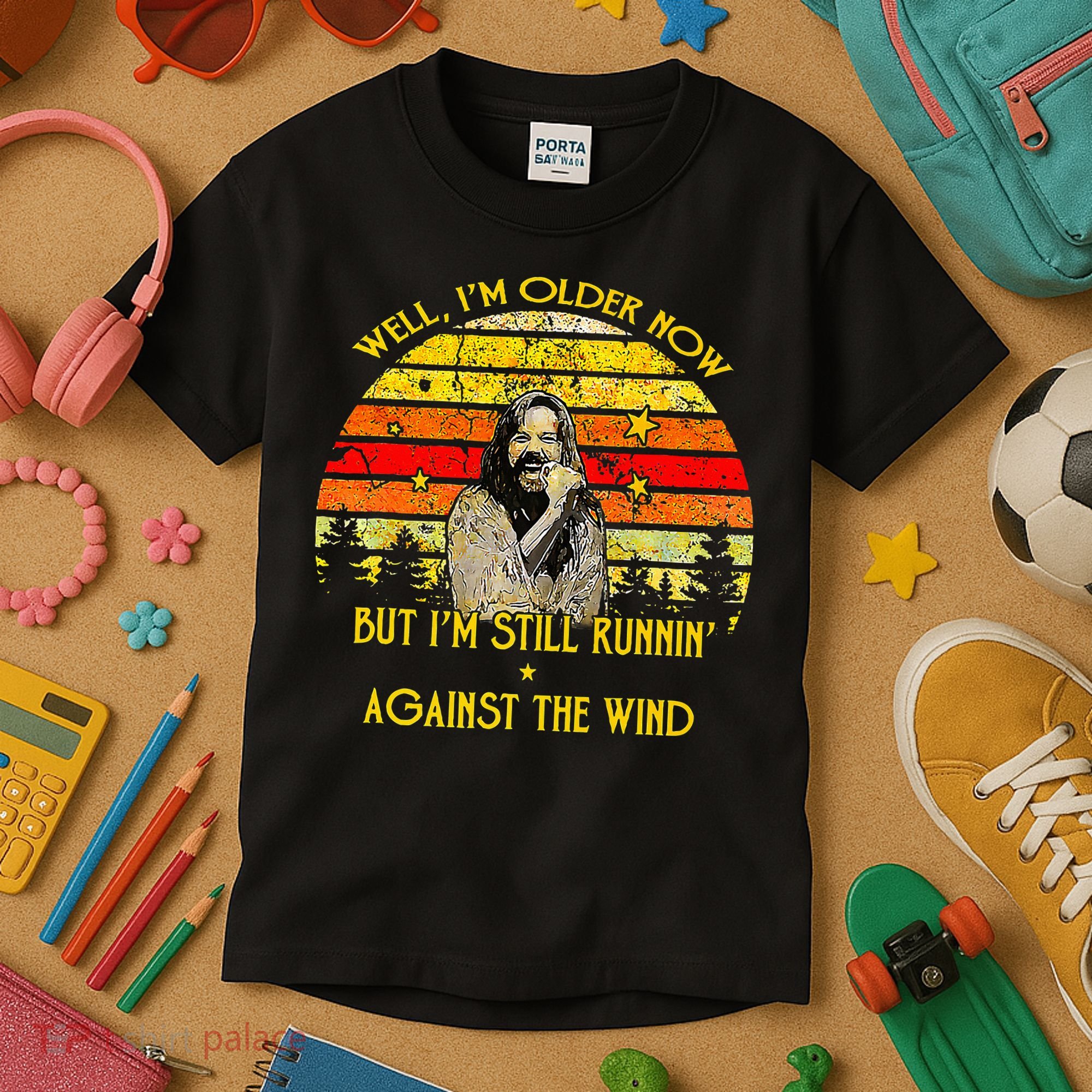 Well I’M Older Now But I’M Still Running Against The Wind Kids T-Shirt