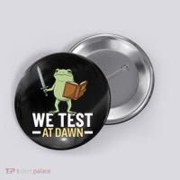 We Test At Dawn Button thumb 0