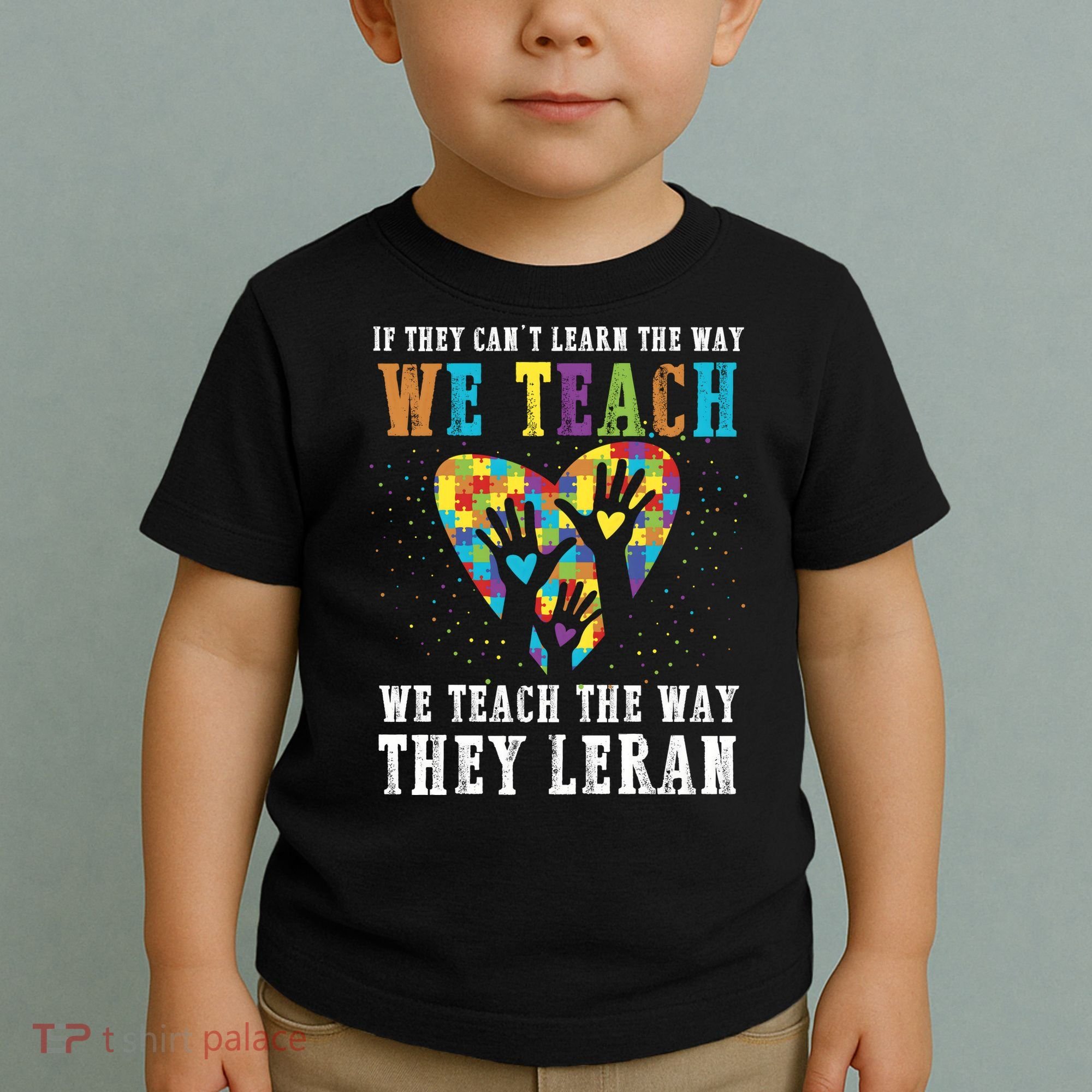 We Teach The Way They Lean Autism Awareness Month Toddler T-Shirt
